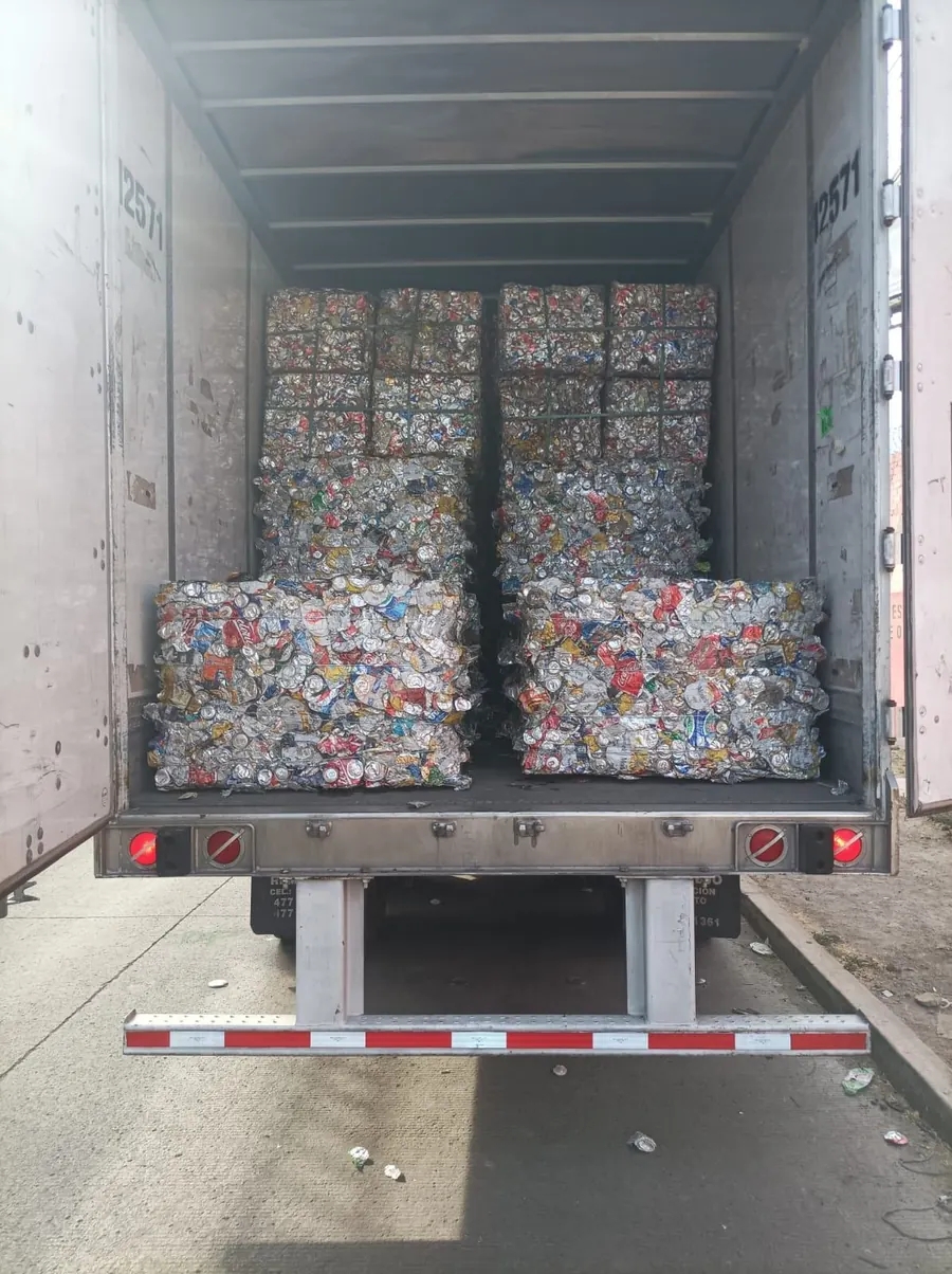 Aluminium UBC bales loaded in trailer — SIDELL Scrap Metal